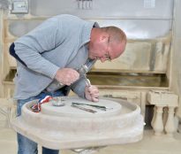 Hand Carving a Stone Bath Raiser