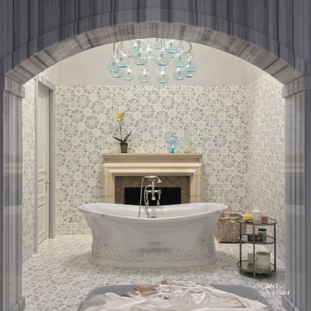 Greek bathhouse-inspired limestone bathtub by Ancient Surfaces, featuring intricate details and a sturdy form, reminiscent of the grand structures of Athens and Thessaloniki, serving as a tangible link to Greece's rich architectural heritage.
